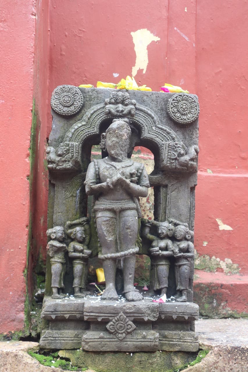 Temple courtyard with devotees